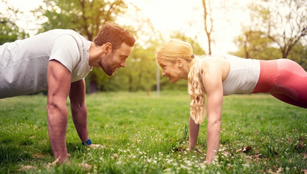 Man and woman working out together and being healthy to boost their fertility before north houston IVF