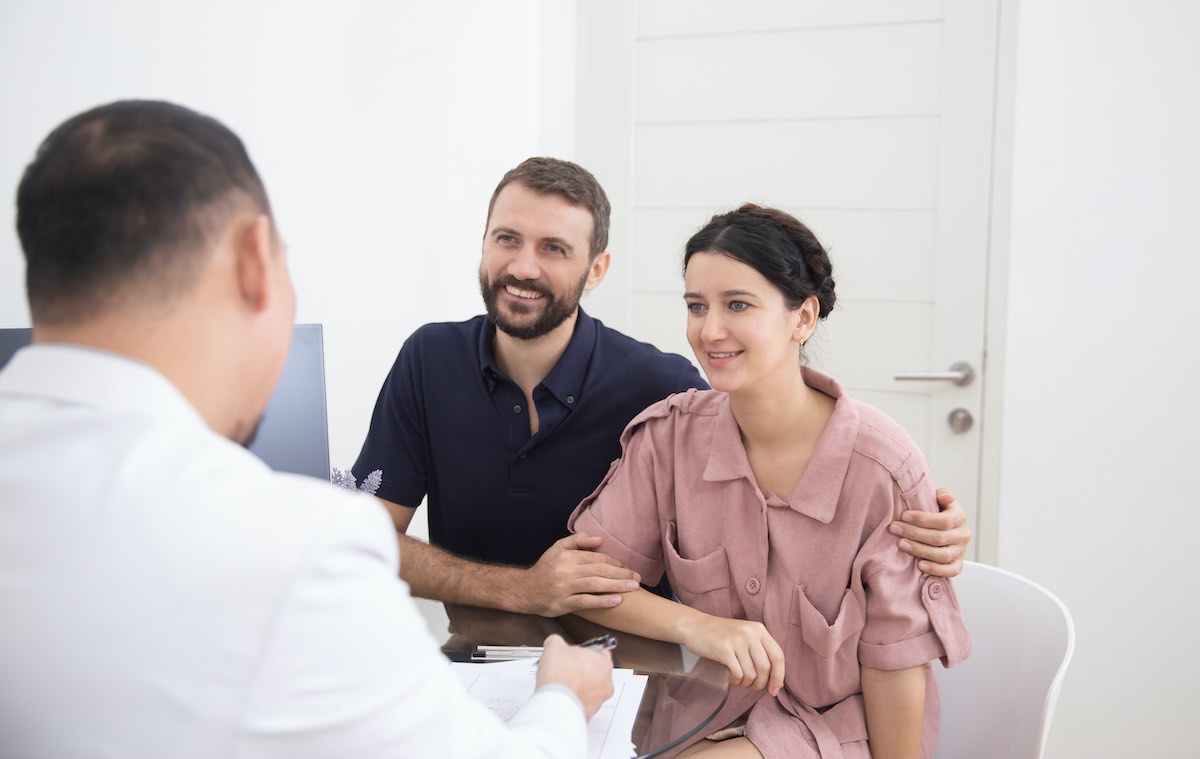 couple discussing IUI and IVF at our North Houston fertility clinic in The Woodlands