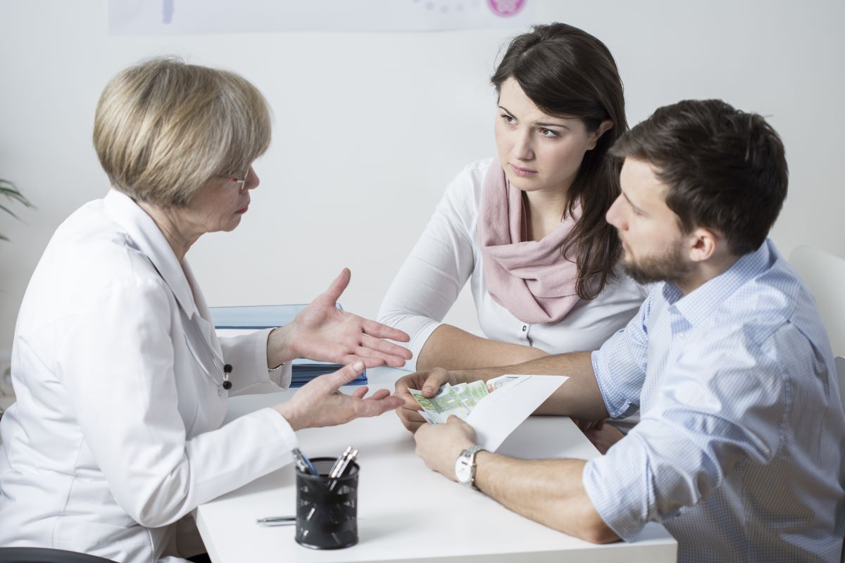 Couple discuss The Woodlands IVF process with North Houston fertility specialist