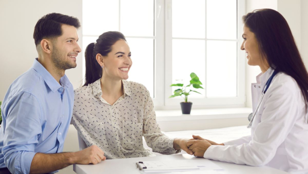 A couple consulting with a fertility specialist