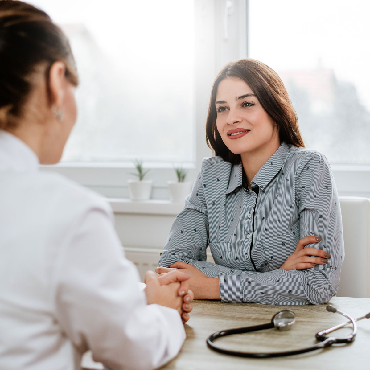 A woman consulting with a fertility doctor