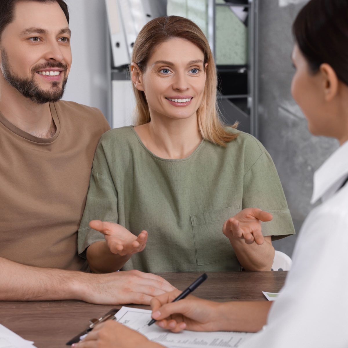 A couple talking to a the Woodlands IVF specialist